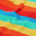 Close up of organic rainbow kids top