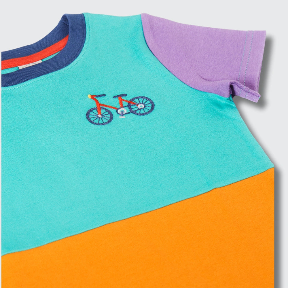 Colorful children's t-shirt with a bicycle design on a gray background