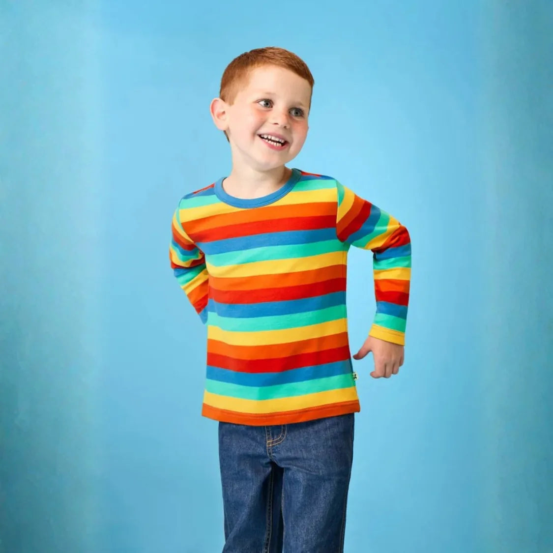 Boy wearing bright organic frugi top