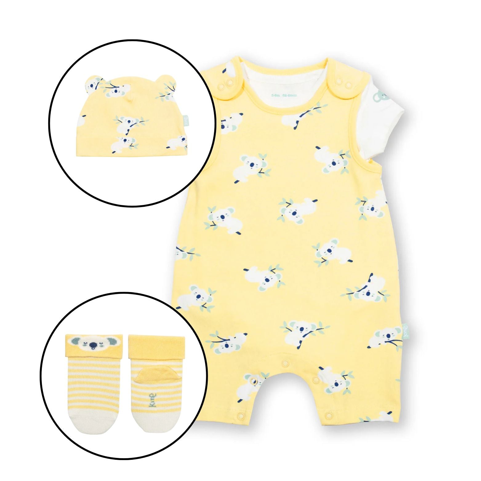 Yellow baby romper with airplane pattern, matching hat, and socks on a white background