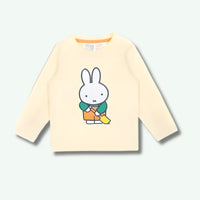 Beige long-sleeve shirt with a cartoon character on a white background