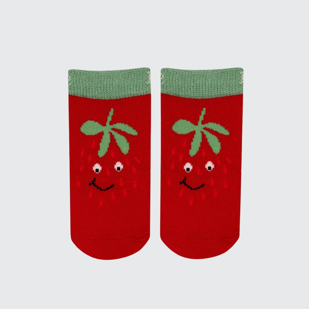A pair of red ankle socks with a green ribbed cuff, featuring a cute embroidered strawberry face on the front.