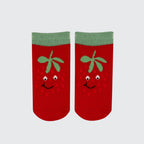 A pair of red ankle socks with a green ribbed cuff, featuring a cute embroidered strawberry face on the front.