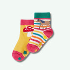 Two colorful children's socks with animal designs on a white background