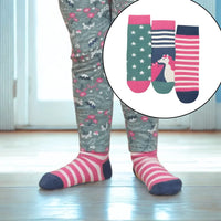young girl wearing gray patterned leggings and pink striped socks with inset of colorful socks.
