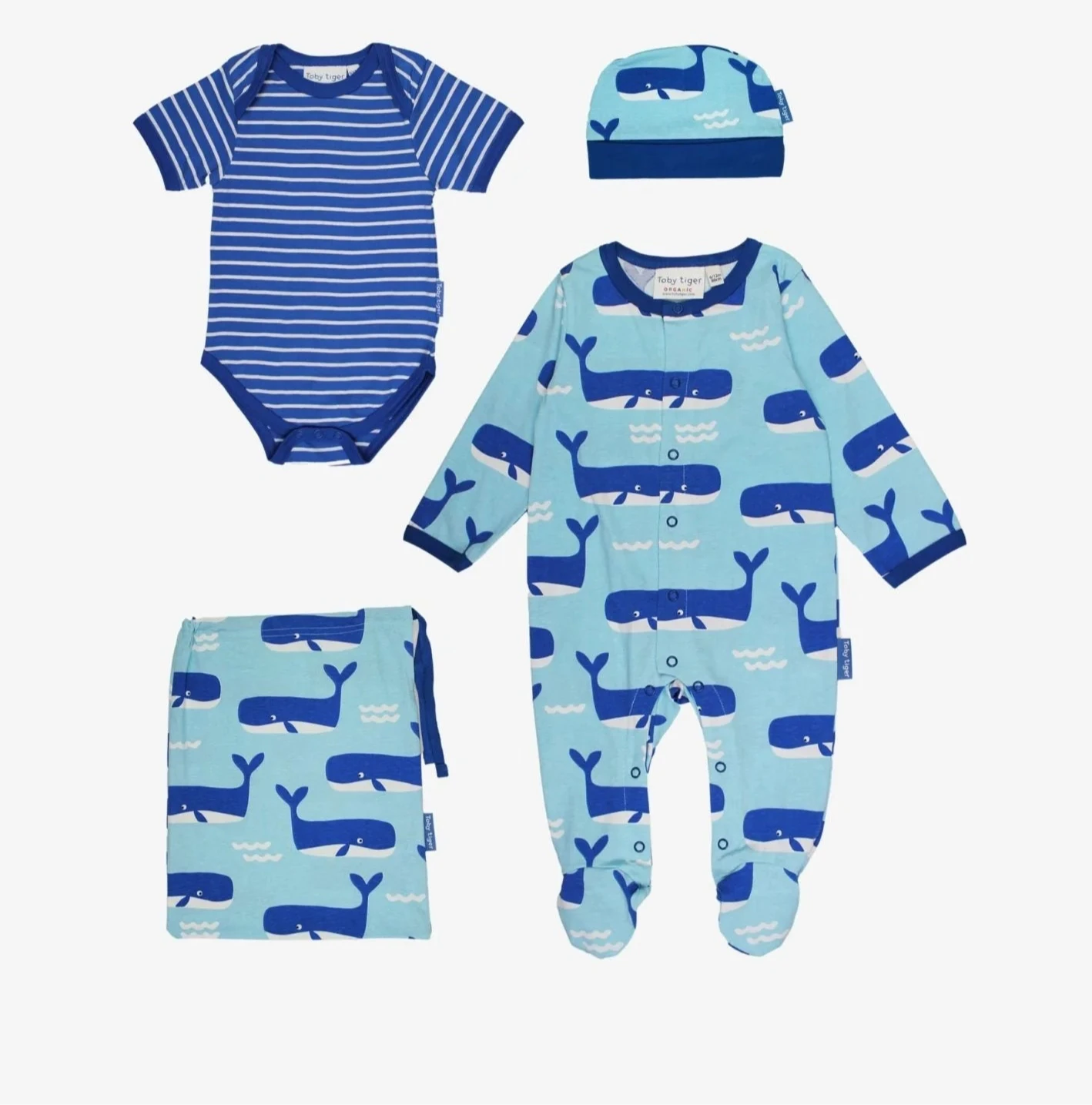Collection of baby clothing items including a onesie, hat, and pants on a white background.