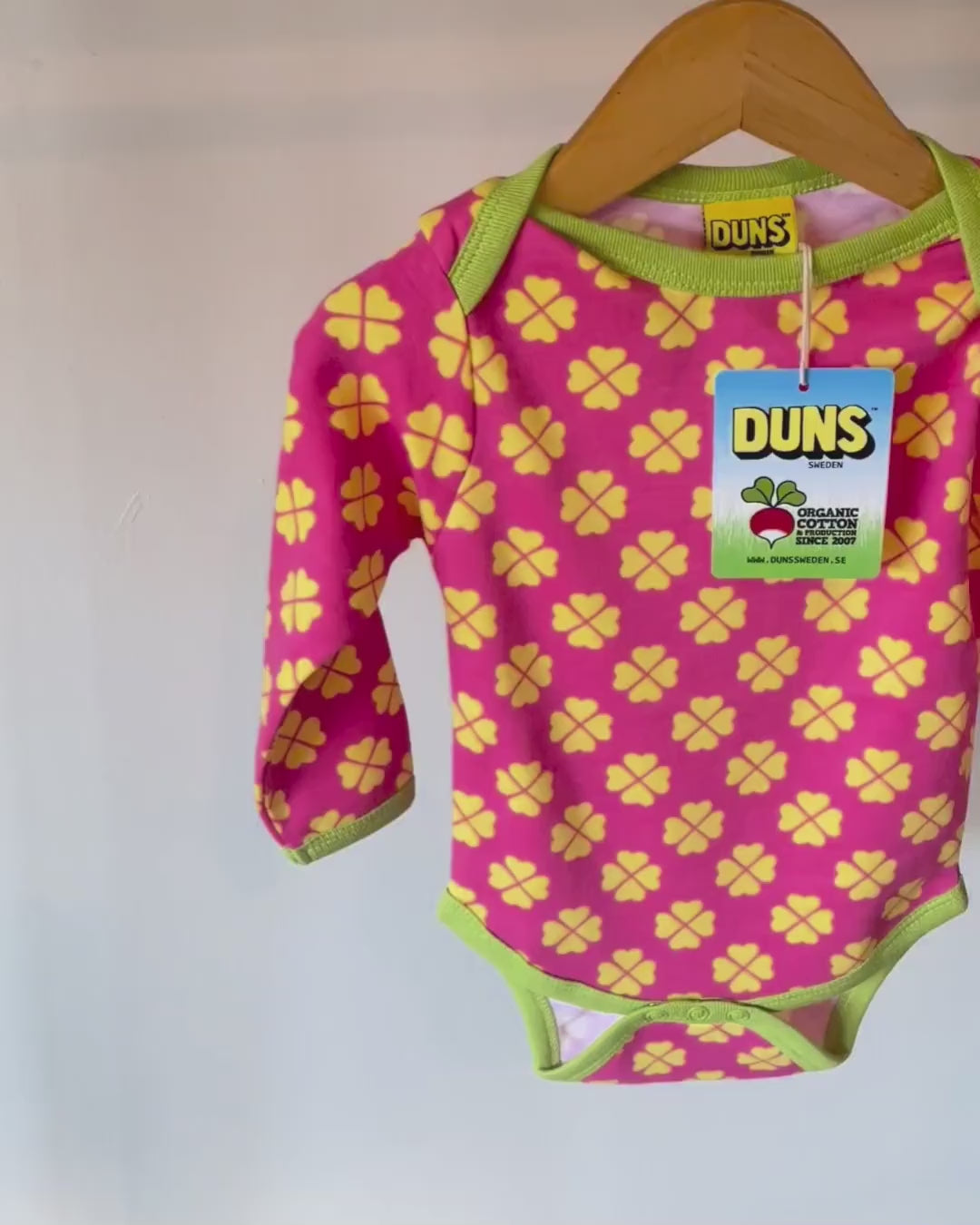 DUNS Sweden pink infant bodysuit