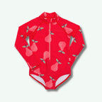 Red children's swimsuit with pear pattern on a white background