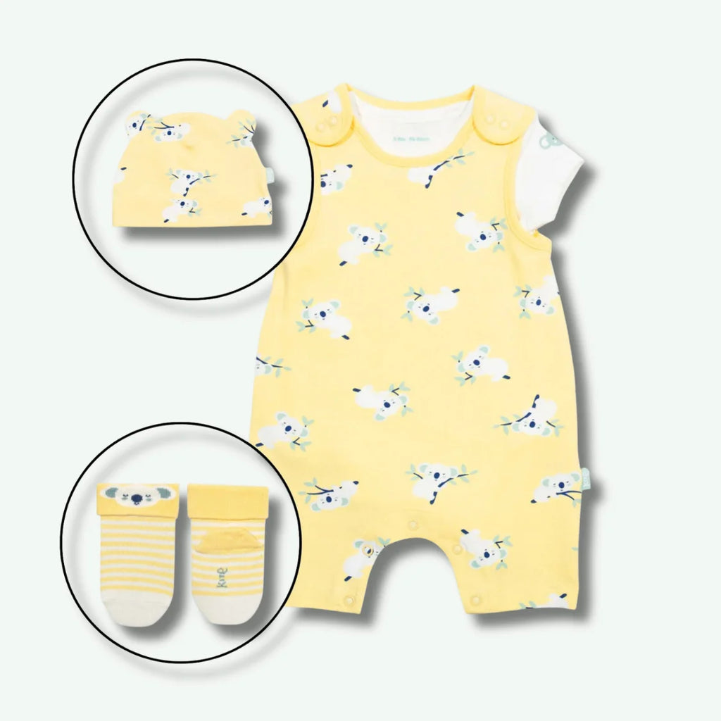 Yellow baby romper with animal pattern, matching hat, and socks on a white background