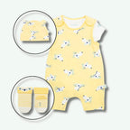 Yellow baby romper with animal pattern, matching hat, and socks on a white background