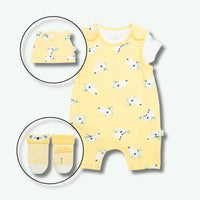 Yellow baby romper with animal pattern, matching hat, and socks on a white background